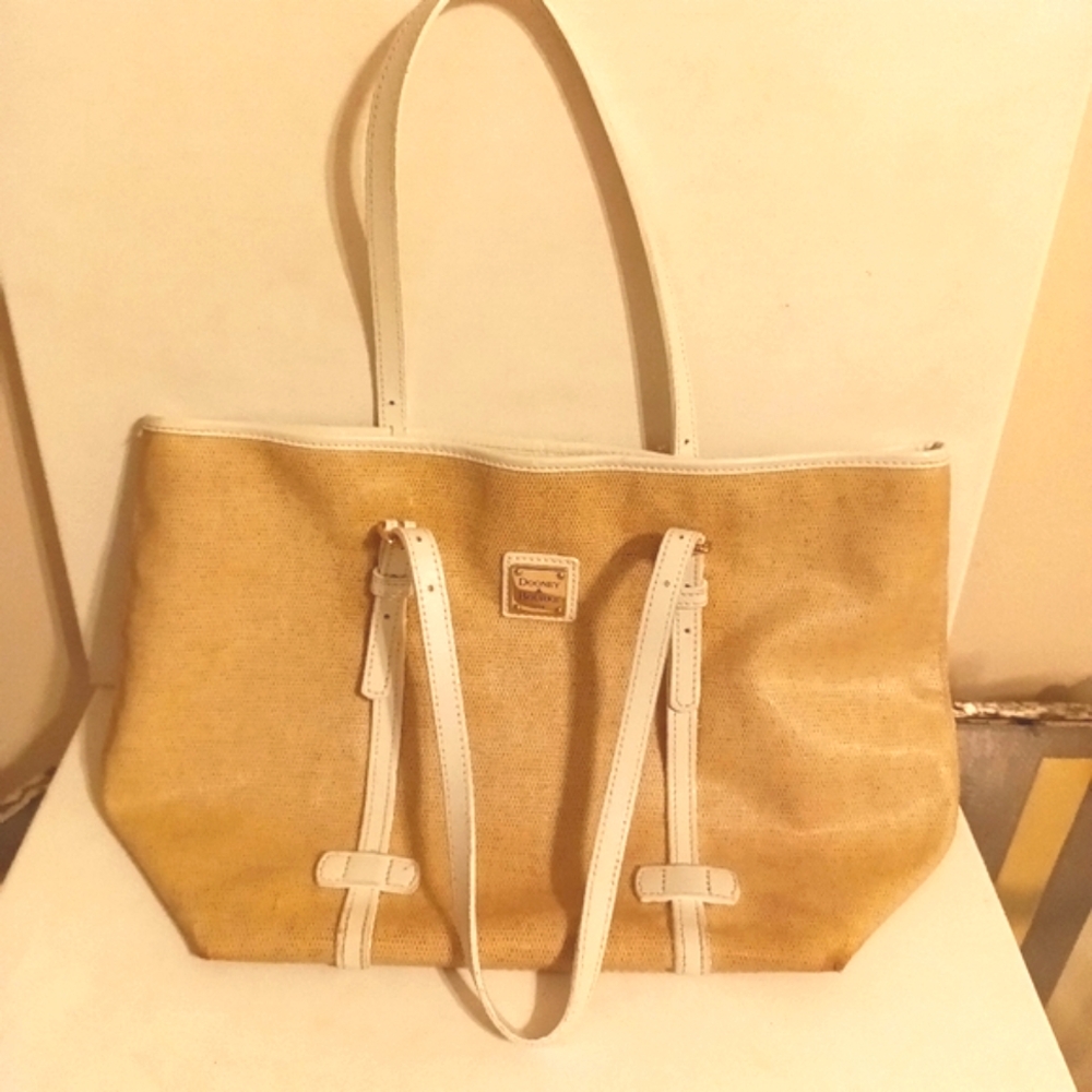 Dooney and Bourke tan coated canvas tote